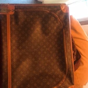 Loui Vuitton garment bag